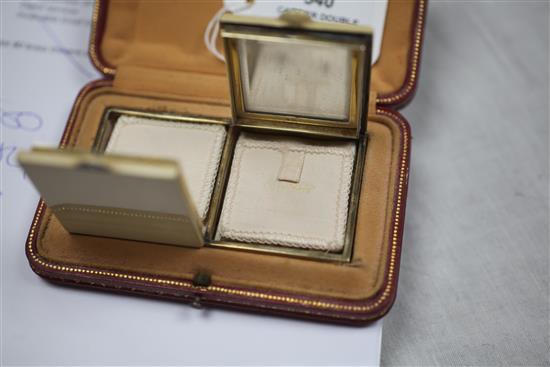 A 1920s French Cartier silver gilt, diamond and cream enamel double lidded compact, 85mm.